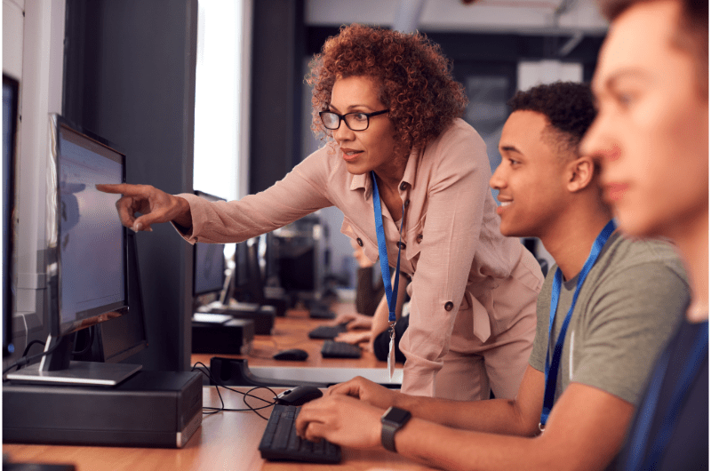 Instructor tutoring a student 